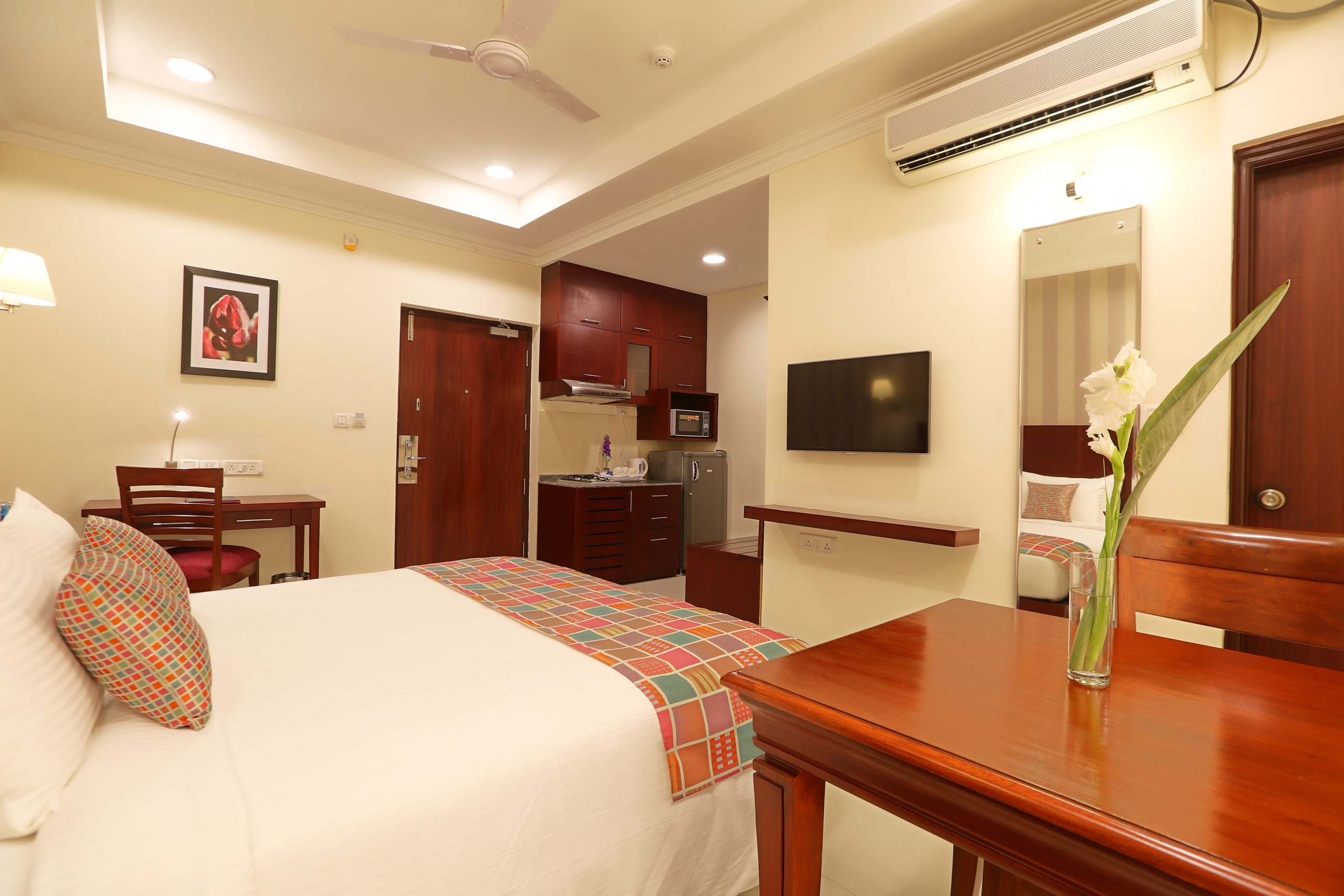 Premier room with curtains and lounge chairs
