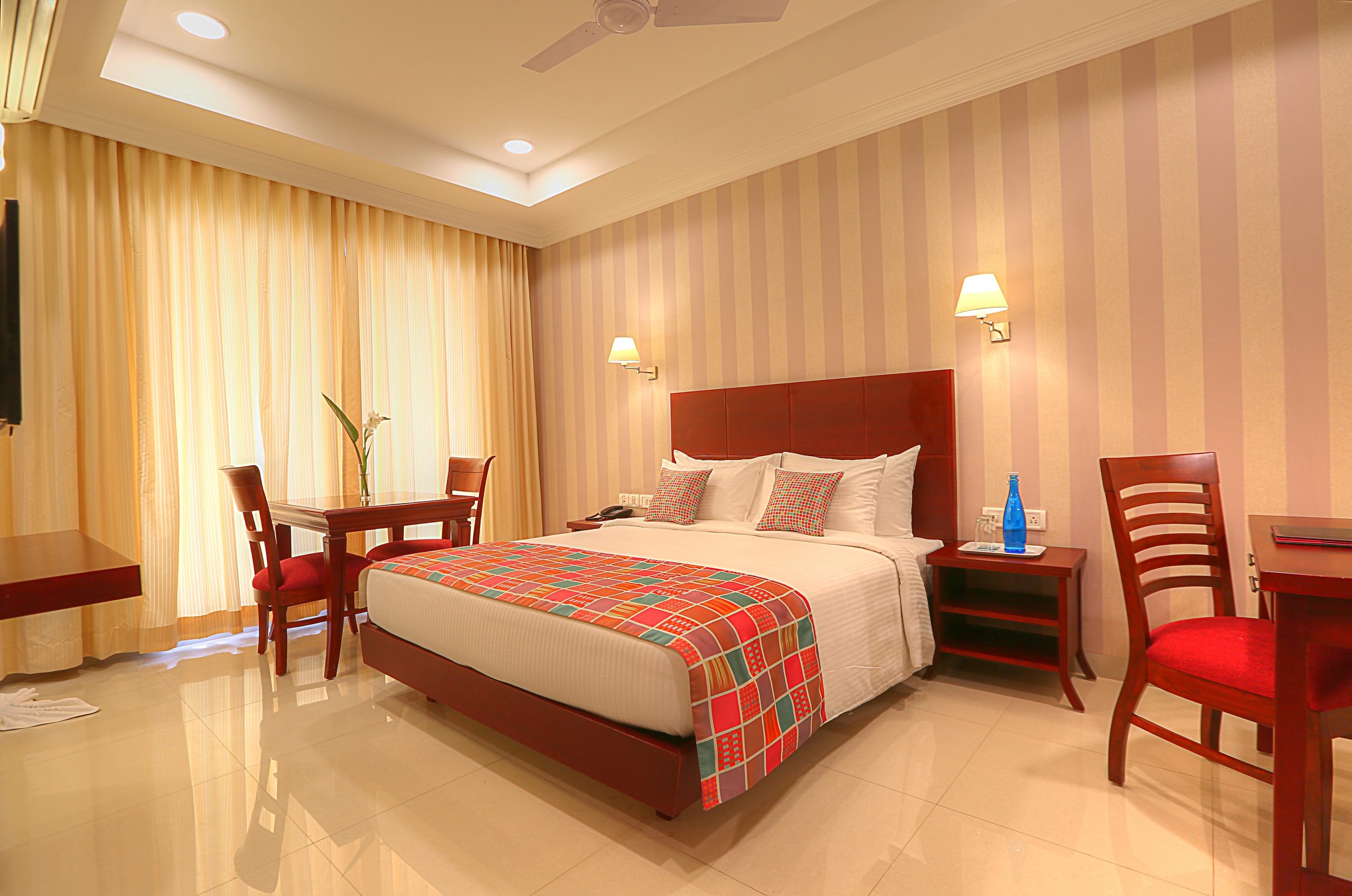 Room with wardrobe, robe and amenities