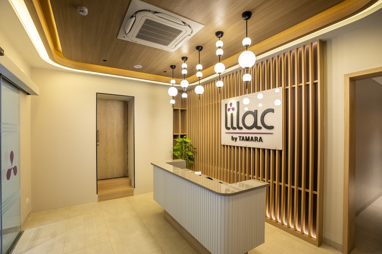 A freshly prepared Lilac room with robe, safe and amenities